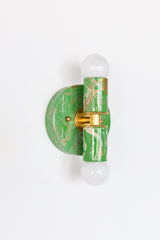 Looking for a small wall sconce with major personality? The marbled Thalia sconce in spring green, cream, and gold adds a fun pop of color and a handmade touch to bathrooms, vanity areas, and other small-scale spaces. Each sconce is hand-marbled, giving it a completely unique pattern that feels custom and special. This style works beautifully in dopamine decor interiors, maximalist rooms, and eclectic homes that mix color, vintage influence, and unexpected details.