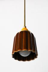 Chicory brown ceramic pendant light with ribbed shaped, celadon style glaze. Modern hand-made pendant light inspired by art deco design.  With a matte mustard ball and brass hardware.  Beautiful ceramic pendant light for bathrooms, small rooms, kitchens, and more. 