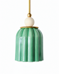 pastel green celadon glazed ceramic pendant light and cream powdercoated ball with brass hardware. Art deco inspired pendant light for kitchens, small spaces, and more.