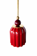 jasper red art deco pendant light with ribbed ceramic shade, powdercoated black cherry ball, and brass hardware. Beautiful rich red hanging pendant light handmade in new orleans by Sazerac Stitches.