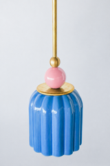 pastel light blue celadon-style glazed ribbed pendant light with blue pink powdercoated ball and brass hardware.  Art deco inspired pendant light fixture. Made in New Orleans by Sazerac Stitches