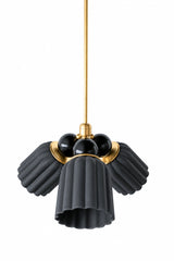 A small chandelier with matte, fluted cone shades in unglazed black, paired with glossy black glass balls and brass hardware. The contrast between the flat matte finish and the high-shine balls gives this monochrome fixture real texture and depth, no color needed. A strong pick for a moody dining room, a dark-painted study, or any space leaning into drama and contrast rather than a lighter, more coastal palette.