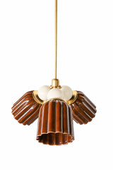 A small chandelier with glossy, glazed fluted ceramic cone shades in chicory brown, paired with cream powder-coated steel balls and brass hardware. The cream balls bring real contrast against the rich brown glaze, keeping the fixture warm without reading too dark or heavy. A good fit for a traditional dining room, an entry, or any space that wants a statement chandelier with an earthy, collected feel.
