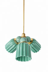 A small chandelier with glossy, glazed fluted ceramic cone shades in jade green, paired with vista green connector balls and brass hardware. Two close tones of green keep this fixture cohesive and botanical rather than contrasting, a strong pick for an English cottage dining room, a conservatory-style space, or anywhere leaning into natural, garden-inspired color.