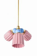 A pink and blue chandelier that leans sweet without tipping into saccharine. The Marcella Small Chandelier pairs three fluted, scalloped ceramic shades in pastel pink with a cluster of celestial blue glass globe bulbs and brass hardware, a grandmillennial combination that reads playful and collected rather than matchy. A fresh pick for a girls’ bedroom, nursery, or colorful bathroom.