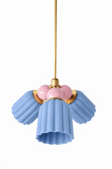 A blue and pink chandelier with a grandmillennial, Southern-feminine streak. The Marcella Small Chandelier pairs three fluted, scalloped ceramic shades in dusty matte blue with a cluster of blush pink glass globe bulbs and brass hardware, a soft but not saccharine combination. A lovely fit for a nursery, girls’ bedroom, or powder room that wants color with a gentle hand.