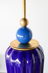bright blue glazed ceramic shade with blue powdercoated ball and brass hardware. Colorful art deco style pendant light by Sazerac stitches