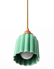 pastel green celadon glazed ceramic pendant light and terra cotta powdercoated ball with brass hardware. Art deco inspired pendant light for kitchens, small spaces, and more.