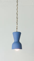 bright blue and brass chained ceramic pendant lighting fixture. Made in the USA hand-cast tinted porcelain pendant kitchen light with real raw brass chain.  Beautiful unglazed porcelain ceramic pendant ceiling light fixture. Matte blue porcelain chinoiserie inspired pendant light fixture.