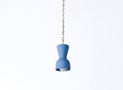 bright blue and brass chained ceramic pendant lighting fixture. Made in the USA hand-cast tinted porcelain pendant kitchen light with real raw brass chain.  Beautiful unglazed porcelain ceramic pendant ceiling light fixture. Matte blue porcelain chinoiserie inspired pendant light fixture.