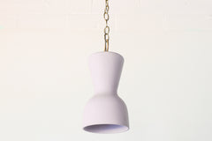 Pastel purple and brass chained ceramic pendant lighting fixture. Made in the USA hand-cast tinted porcelain pendant kitchen light with real raw brass chain.  Beautiful unglazed porcelain ceramic pendant ceiling light fixture. 