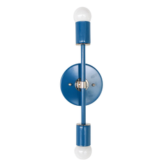 Front-facing studio photo of the Medium Thalia Sconce in glossy Denim Blue with polished chrome hardware and two white globe bulbs. This colorful two-light wall sconce has a slim vertical shape that works beautifully for bathroom vanity lighting, powder rooms, kids bathrooms, hallways, bedrooms, and playful interiors with blue, white, chrome, or modern retro accents.