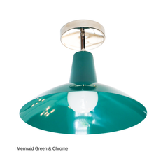 The Bruxelles Flushmount is built for ceilings that don't have room for a hanging pendant, with a wide, angled mermaid green shade and chrome hardware that keeps it feeling clean and architectural. It's a natural fit over a kitchen island, in an entryway, or lighting a hallway or laundry room, anywhere you want real color overhead without sacrificing headroom.
