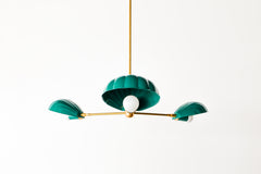 Three-arm chandelier with scalloped shell design in green and brass