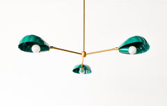 Art Deco-inspired coastal shell chandelier in green with brass accents