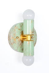 Hand-marbled Small Thalia Sconces in a soft mint, cream, and gold finish, shown as a product image with three slightly different marbled patterns. Each small two-light wall sconce has its own one-of-a-kind surface, with painterly swirls of pale green, ivory, and metallic gold. A pretty choice for muted kids bathrooms, small powder rooms, grandmillennial decor, chinoiserie-inspired spaces, cottage bathrooms, or colorful vanity lighting that still feels soft and refined.