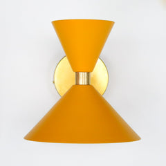 Mustard and Brass Wall Sconce by Sazerac Stitches. Mid century modern style shape
