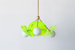 Illuminate your world with the playful glow of the Circus Chandelier in neon green