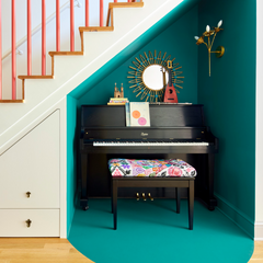 Piano Nook painted in turquoise with a floral wall sconce with flower cups, bright colors and decor