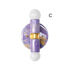 With its glossy lavender marbling and sculptural silhouette, this Thalia sconce feels like functional jewelry for the wall. The brass center adds warmth and contrast, while the soft purple tones make it ideal for grandmillennial interiors, feminine spaces, or charming vintage-inspired rooms.