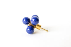 Oversized Ball-Cube Knob in Navy, featuring five powder-coated spheres on a brass cube base. This luxurious 2.75-inch-wide drawer pull is handmade and customizable in 30 curated colors, adding an artistic, high-end touch to cabinets, dressers, or drawers