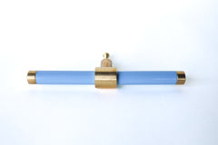 Pastel baby Blue& Brass modern drawer pull.  Add color to cabinets with brass accents with the Piety drawer pulls by sazerac stitches.  Available in over 30 colors with the option to customize. Center mount installation drawer pull with color and brass accents.  Sophisticated colorful bathroom, dresser, vanity, or desk drawer pull.  