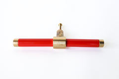 Poppy Orange Red and brass modern drawer pull.  Add color to cabinets with brass accents with the Piety drawer pulls by sazerac stitches.  Available in over 30 colors with the option to customize. Center mount installation drawer pull with color and brass accents.  Sophisticated colorful bathroom, dresser, vanity, or desk drawer pull.  