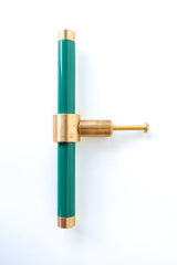 Rich, Emerald Green and brass modern drawer pull.  Add color to cabinets with brass accents with the Piety drawer pulls by sazerac stitches.  Available in over 30 colors with the option to customize. Center mount installation drawer pull with color and brass accents.  Sophisticated colorful bathroom, dresser, vanity, or desk drawer pull.  