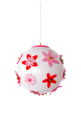 Pink and red Blossom Gumball Chandelier featuring a 16 inch white globe pendant shade decorated with layered acrylic flower appliqués in hot pink, blush pink, and cherry red with brass center caps, a playful flower power statement pendant light for maximalist interiors, kids rooms, nurseries, and dopamine decor homes.
