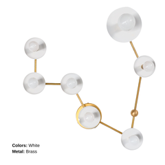 Pisces constellation light fixture with glossy white powder coated steel discs and brass hardware, modern star sign wall sconce with white globe bulbs, statement lighting for a playful bathroom sconce over mirror, artful hallway light, or colorful maximalist home decor with mid century modern vibes