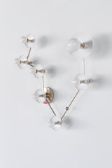 Pisces zodiac constellation wall sconce in glossy white with polished chrome hardware, featuring multiple round powder coated steel discs on branching arms with small globe bulbs, a sculptural celestial statement light for a modern bathroom vanity, powder room lighting, hallway or bedroom wall, mid century modern inspired design with an artful star sign layout for astrology lovers, maximalist interiors, and eclectic homes that want a clean white fixture with personality and gallery style impact.