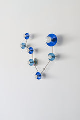 Two-tone blue Pisces star-sign wall light with glossy Mediterranean blue and hydrangea blue powder-coated steel discs on sleek chrome rods, sculptural constellation-inspired layout with multiple globe bulbs; quirky modern lighting for an artistic bathroom mirror, fun powder room, kids or teen room, or gallery wall, perfect for maximalist design, dopamine decor, coastal color palette interiors, and anyone decorating with bold blues.
