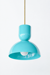 pastel teal, tiffany blue, or aqua & brass bold geometric pendant light with a dome shade. glossy finish. Great kitchen pendant light. Good for small spaces or small dining tables. Bold, mid-century modern style pendant light that is great for maximalists or eclectic style decor. 