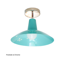 The Bruxelles Flushmount in Poolside brings a soft, spa-like aqua to a fixture built for ceilings that can't fit a hanging pendant. The wide, angled shade and cool chrome hardware keep it feeling clean and calm, making it a strong pick for a bathroom, a kitchen island, an entryway, or a nursery where you want gentle color overhead.

