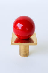 Glossy red Square Gumball Drawer Pull made from powder-coated steel and raw brass. Perfect for cabinets, dressers, vanities, or nursery furniture. Adds a bold pop of color and playful whimsy to bathrooms, kitchens, or kids’ rooms. Handmade hardware that’s both modern and fun.