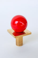 Glossy red Square Gumball Drawer Pull made from powder-coated steel and raw brass. Perfect for cabinets, dressers, vanities, or nursery furniture. Adds a bold pop of color and playful whimsy to bathrooms, kitchens, or kids’ rooms. Handmade hardware that’s both modern and fun.