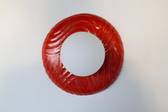 One-of-one handmade ceramic sconce in rich lipstick red with raised wavy relief pattern and a matte white globe, sculptural modern wall or ceiling fixture with hidden hardware, artisan statement lighting for bold color interiors, gallery-style spaces, and contemporary home decor
