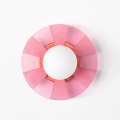Pastel Pink pop-art inspired wall light fixture sconce.  Made of translucent pink acrylic that has been etched so that some parts are more opaque than others. The etching pattern is a stripe pattern.  Mimics pop art design and creates a fun shadow when the light is on.  Designed and made in New Orleans, LA. 