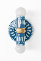 Handpainted blue and white patterned wall sconce inspired by Greece & Portugal.  Maximalist style wall sconce that has a natural element because each one is hand-painted.  The painted thalia is a perfect small sconce that doubles as a statement light fixture because of the bold design.  Great for bathrooms, hallways, and more.  