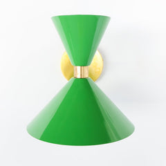Bright grass green and brass mid century modern style cone-shaped wall sconce.  Designed and made in New Orleans.  Bright green modern wall sconce that can be used in bedrooms, bathrooms, and more.  Fun and colorful lighting. Large Green wall sconce.