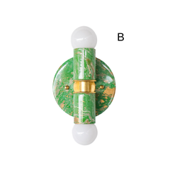 Looking for a small wall sconce with major personality? The marbled Thalia sconce in spring green, cream, and gold adds a fun pop of color and a handmade touch to bathrooms, vanity areas, and other small-scale spaces. Each sconce is hand-marbled, giving it a completely unique pattern that feels custom and special. This style works beautifully in dopamine decor interiors, maximalist rooms, and eclectic homes that mix color, vintage influence, and unexpected details.
