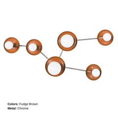 Modern celestial wall sconce in Fudge with chrome detailing and white globe bulbs, designed to resemble the Taurus constellation. A beautiful choice for earthy interiors, organic modern homes, cozy dens, hallways, and statement-making bedside lighting.