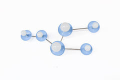 Taurus constellation wall sconce in Celestial Blue with sleek chrome arms and white globe bulbs, handmade in New Orleans by Sazerac Stitches. A modern celestial light for pastel bedrooms, hallways, nurseries, and elegant contemporary interiors.