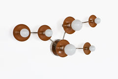 Taurus constellation wall sconce in Fudge with cool chrome arms and white globe bulbs, handmade in New Orleans by Sazerac Stitches. A sculptural celestial wall light for earthy interiors, moody bedrooms, hallways, entryways, and modern eclectic homes.