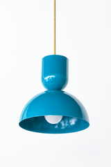 Bold teal & brass bold geometric pendant light with a dome shade. glossy finish. Great kitchen pendant light. Good for small spaces or small dining tables. Bold, mid-century modern style pendant light that is great for maximalists or eclectic style decor. 