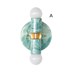 Teal and cream statement sconce in a mid century modern style, compact two-light Thalia wall light with modern globe bulbs and metal accents, ideal for bedside lighting, hallway lighting, or a stylish bathroom vanity wall