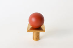 Terra cotta square gumball drawer knob with matte red-orange finish and solid brass base—modern cabinet hardware with a vintage feel. Adds warmth and a bold, earthy pop of color to kitchen cabinets, bathroom vanities, nursery furniture, or eclectic home décor projects.