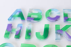 Translucent Green, Purple, & Blue Letters