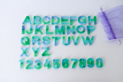 Translucent Teal & Green Letters