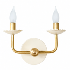 The same clean, modern U-shaped arm in raw brass shows up here in a soft cream instead of a bold color, with scalloped bobeche cups and frosted flame-tip bulbs keeping the traditional candle-sconce detail intact. It is a quieter, more neutral option for a bathroom, hallway, or dining room that wants the shape and the warmth of brass without adding another color to the mix.